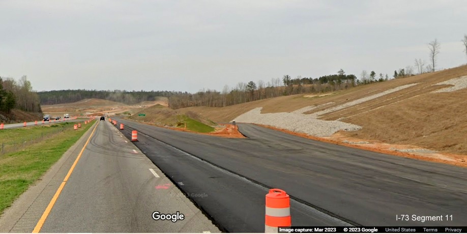 Image of newly paved, but not opened, future US 74 ramp lanes at site of future I-73/I-74 
        Rockingham Bypass interchange, Google Maps Street View, March 2023