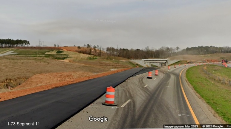 Psving of future US 74 West lanes returning to original alignment at site of future I-73/I-74 
        Rockingham Bypass interchange, Google Maps Street View, March 2023