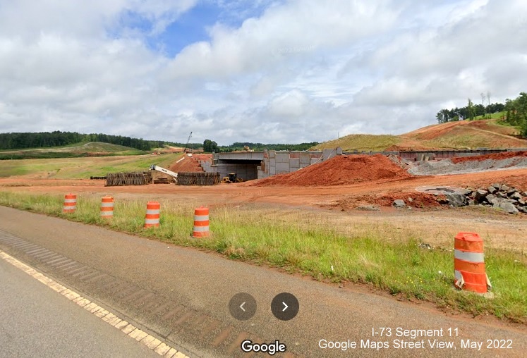 Image of bridge construction for future ramp for I-73/I-74 Rockingham Bypass, Google Maps 
        Street View, May 2022