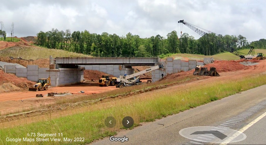 Image of bridge under construction for I-73/I-74 Rockingham Bypass, Google Maps Street View, May 
        2022