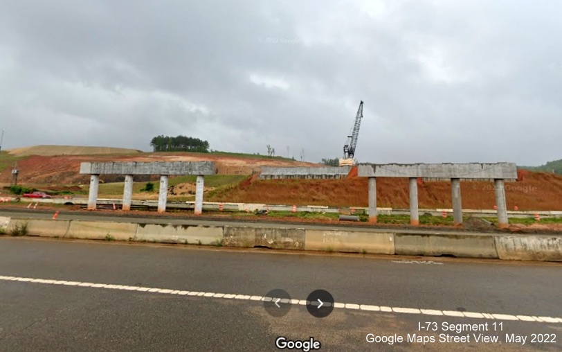 Image of bridge construction for I-73/I-74 Rockingham Bypass as seen from Business US 74, Google Maps Street View, May 
        2022