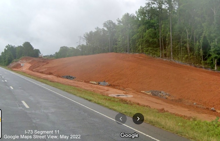 Image of construction of I-73/I-74 Rockingham Bypass ramp as seen from Business US 74 West, Google Maps Street View, May 
        2022