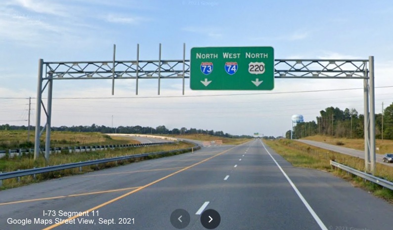Image of sign gantry prior to future off-ramp from US 220 North to I-73 South/I-74 East 
        Rockingham Bypass, Google Maps Street View image, September 2021
