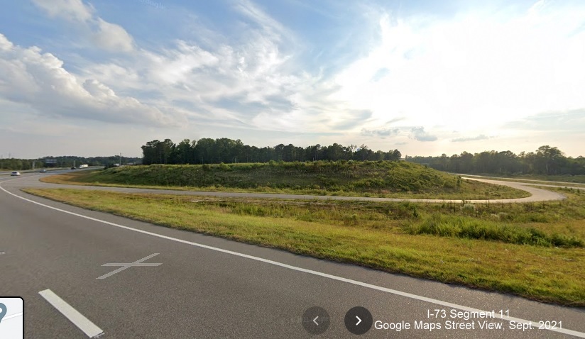 Image taken of future I-73/I-74 Rockingham Bypass roadway from US 220 South ramp of 
        future off-ramp to US 220 South, Google Maps Street View, Sept. 2021