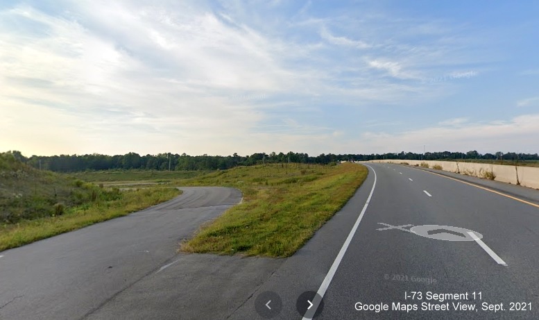 Image taken of looking back future I-73/I-74 Rockingham Bypass off-ramp to US 220 South 
        at northern end of Rockingham Bypass, Google Maps Street View, Sept. 2021