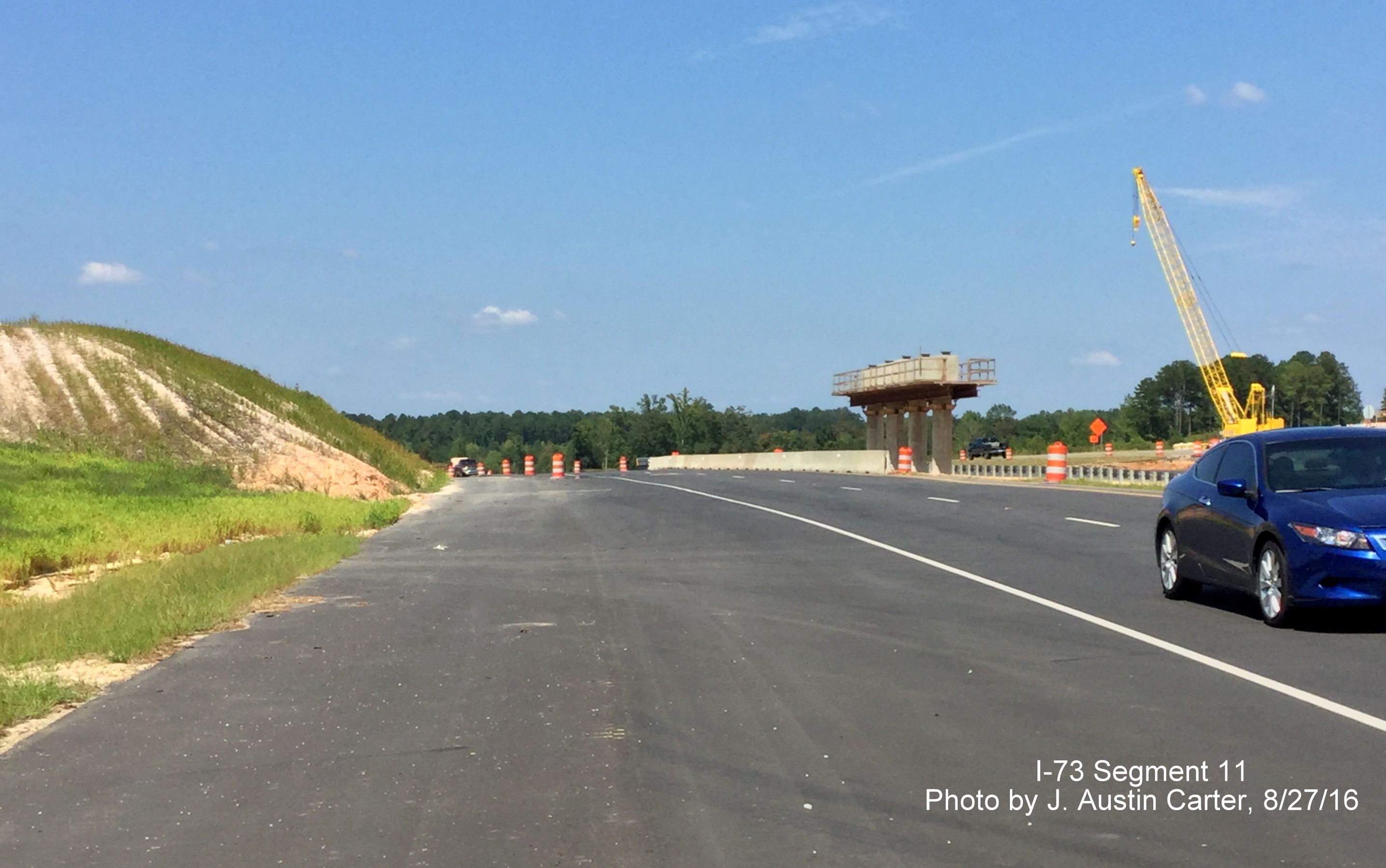 Image of center pier under construction in US 220 median for future Haywood Cemetery Road Bridge over I-73/I-74 north of Rockingham,
        photo by J. Austin Carter