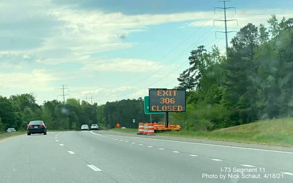 Image of VMS sign warning drivers that Business US 74 exit is closed due to I-73/I-74 Rockingham Bypass 
        construction, by Nick Schaut, April 2021