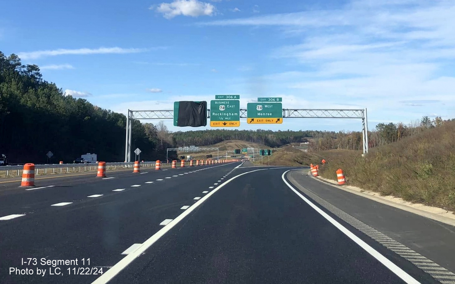 Image of recently placed overhead signage at future exit ramp for US 74 West from I-73 North/I-74 West
        Rockingham Bypass, by LC, November 2024