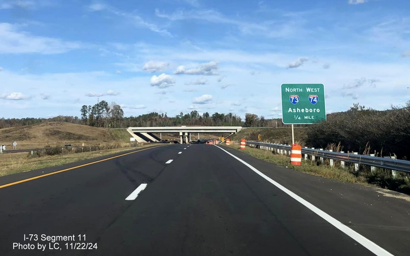 Image of recently placed 1/4 mile advance signage for future exit ramp to I-73 North/I-74 West
        Rockingham Bypass from Business US 74 East, by LC, November 2024