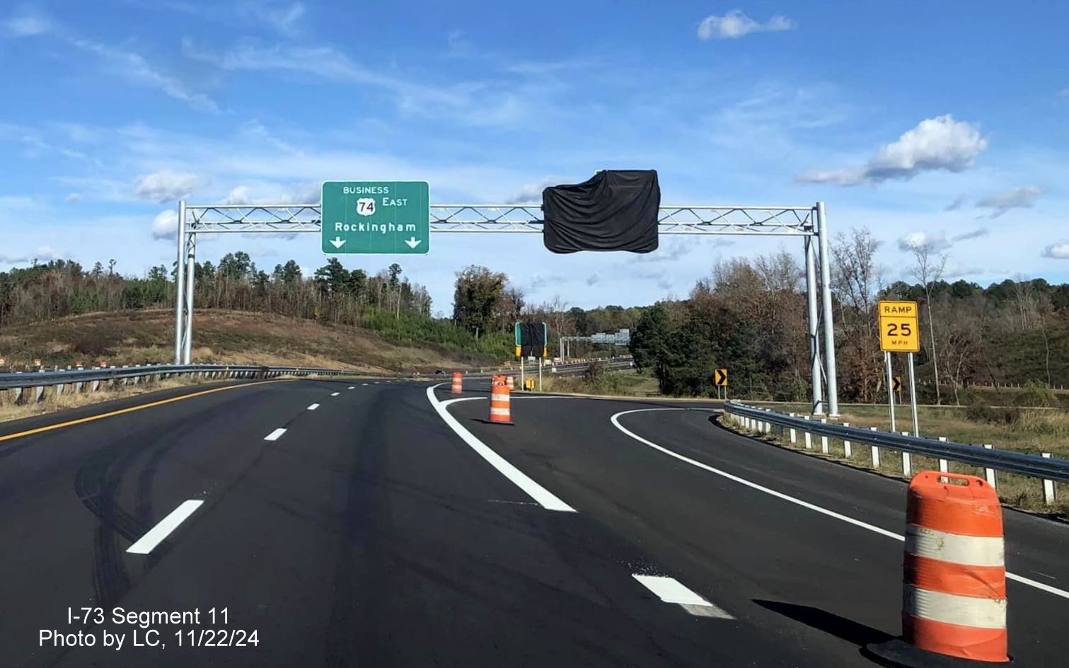 Image of recently placed overhead signage at future exit ramp to I-73 North/I-74 West
        Rockingham Bypass on Business US 74 East, by LC, November 2024