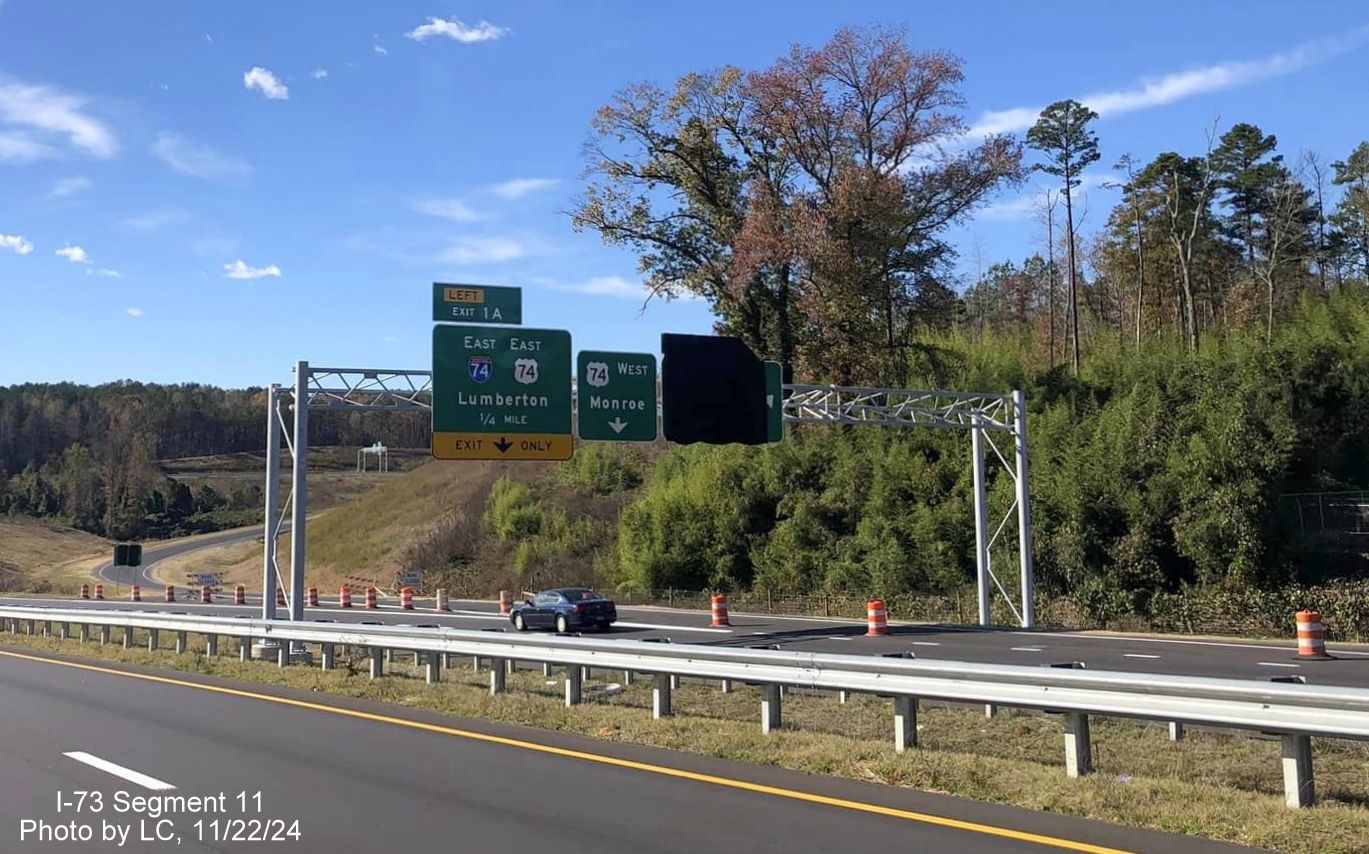 Image of recently placed overhead signage approaching future exit ramp to I-73 North/I-74 West
        Rockingham Bypass on US Business 74 West, by LC, November 2024