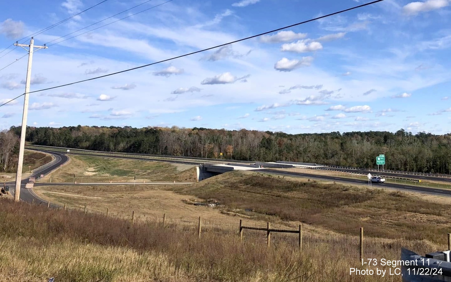 Image of recently covered over I-73 North/I-74 West trailblazers on Cartledge Creek Road, by 
        LC, November 2024