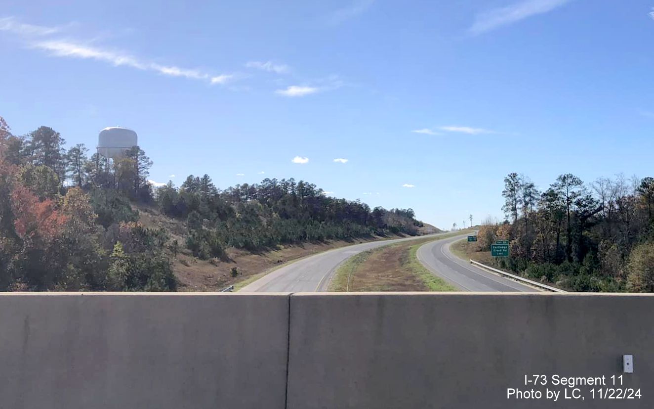 Image of 1 mile advance sign for Cartledge Creek Road on yet to open I-73 South/I-74 East
        Rockingham Bypass as seen from Harrington Road bridge, by LC, November         2024