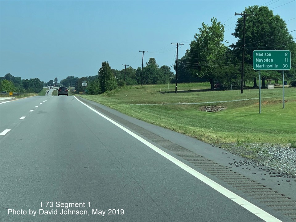 Image of closeup of distance sign approaching first intersection after end of I-73 North in Rockingham County, by David Johnson