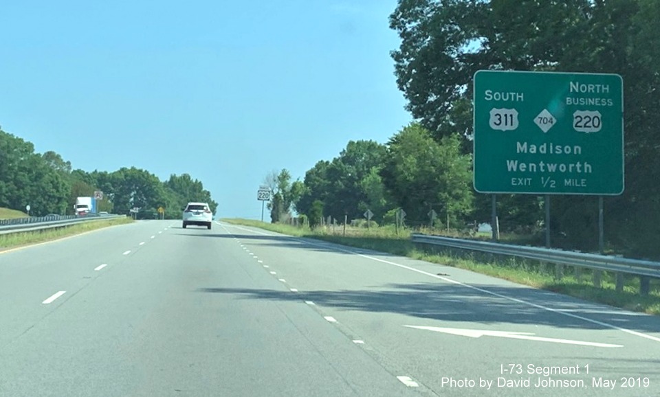 Image of 1/2 mile advance sign for South US 411/NC 704/North US 220 Business exit on US 220 North in Madison, by David Andrews