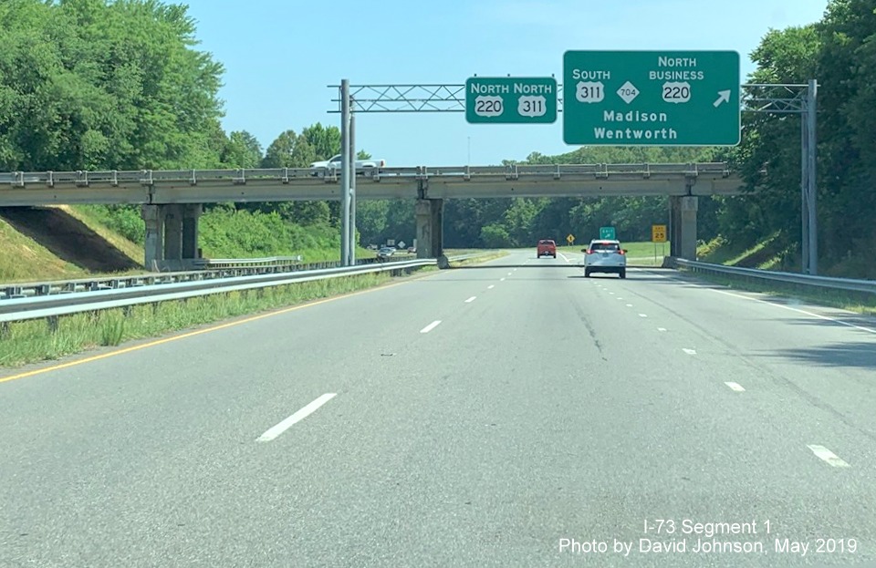 Image of overhead signs at exit ramp to US 311 South/NC 704/US 220 Business North in Madison, by David Andrews