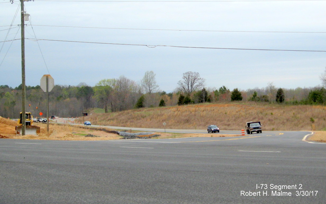 Image of view looking north down future I-73/US 220 North on-ramp from NC 65, now used by traffic in both directions