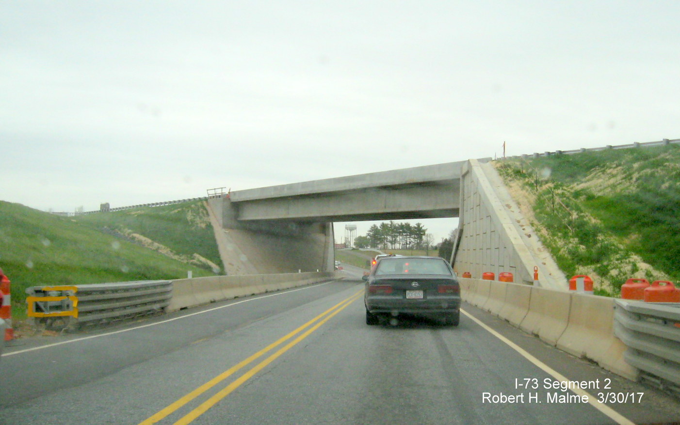 Image of travelling under new I-73 South bridge at end of NC 68 North at US 220