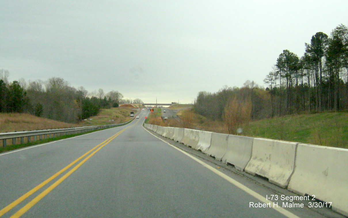 Image of view looking south along current US 220 roadway which will become northbound lanes after NC 68 interchange project is 
        completed