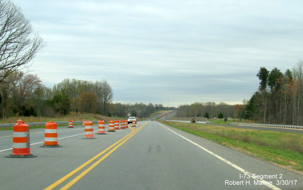 Image of view looking south along US 220 just beyond NC 65 bridge showing construction progress