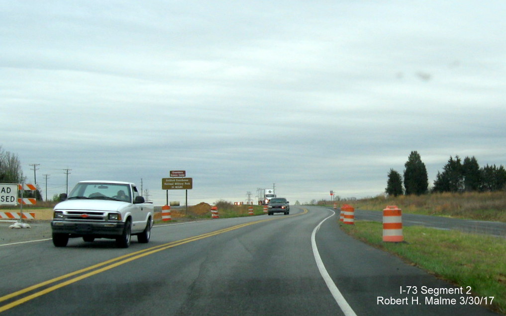 Image of view from US 220 South showing traffic switching between completed Future I-73 North and South lanes
