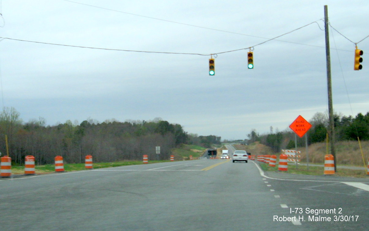 Image of view looking north along US 220 roadway at current intersection with NC 65 at future northbound on-ramp.
