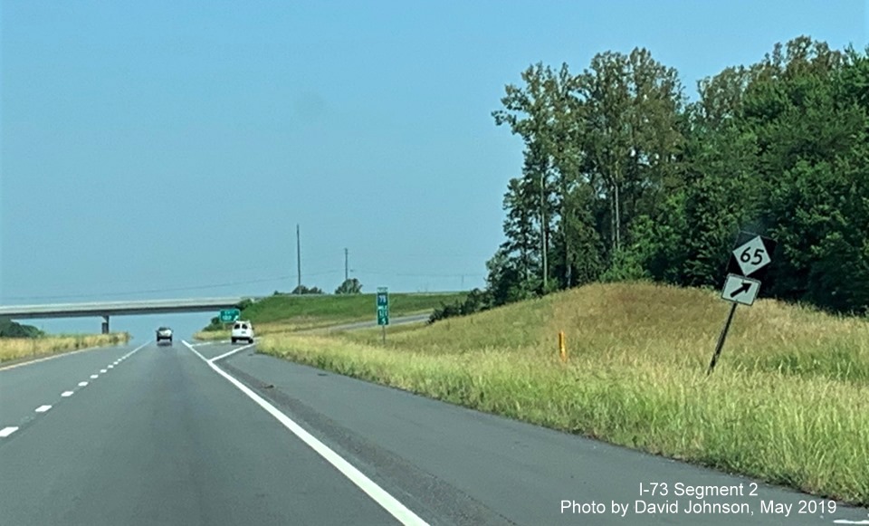 Image of temporary NC 65 trailblazer still in place instead of guide sign for NC 65 exit on I-73/US 220 North near Stokesdale, by David Johnson