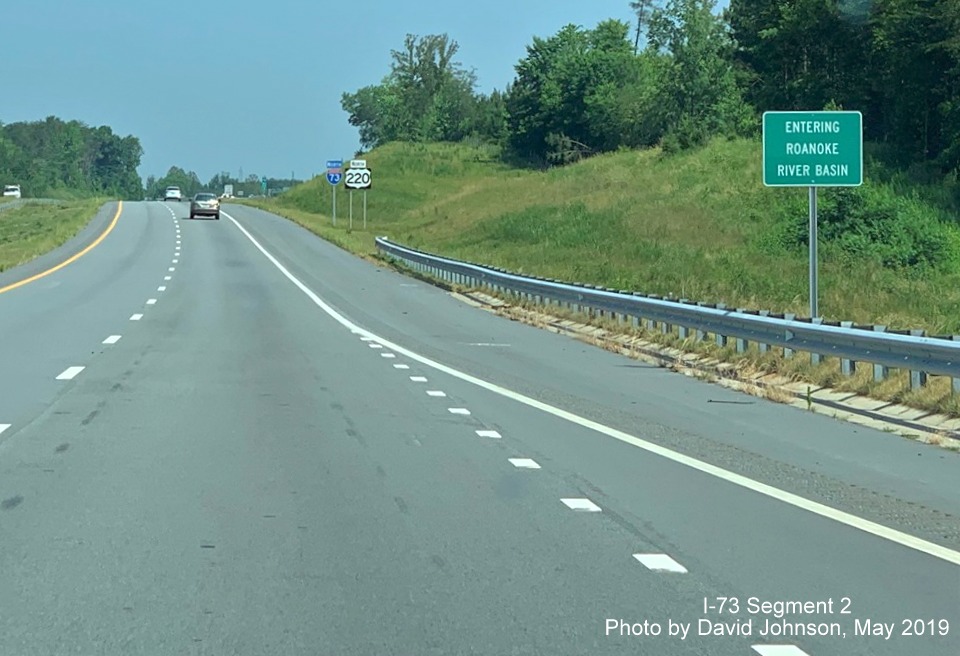 Image of small guide sign for Roanoke River Basin on I-73/US 220 North near Stokesdale, by David Johnson