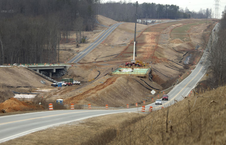 Image of progress widening US 220 to become I-73, Lyn Hay 
Greensboro News Record, 2/1/14