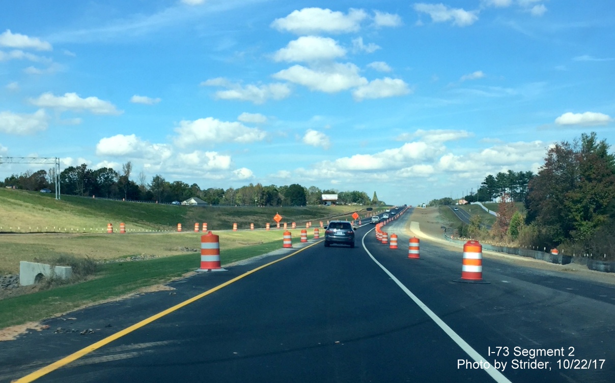 Image of Future end of I-73 North at NC 68 showing continued work needed on highway shoulders before 
          route can be completed, by Strider
