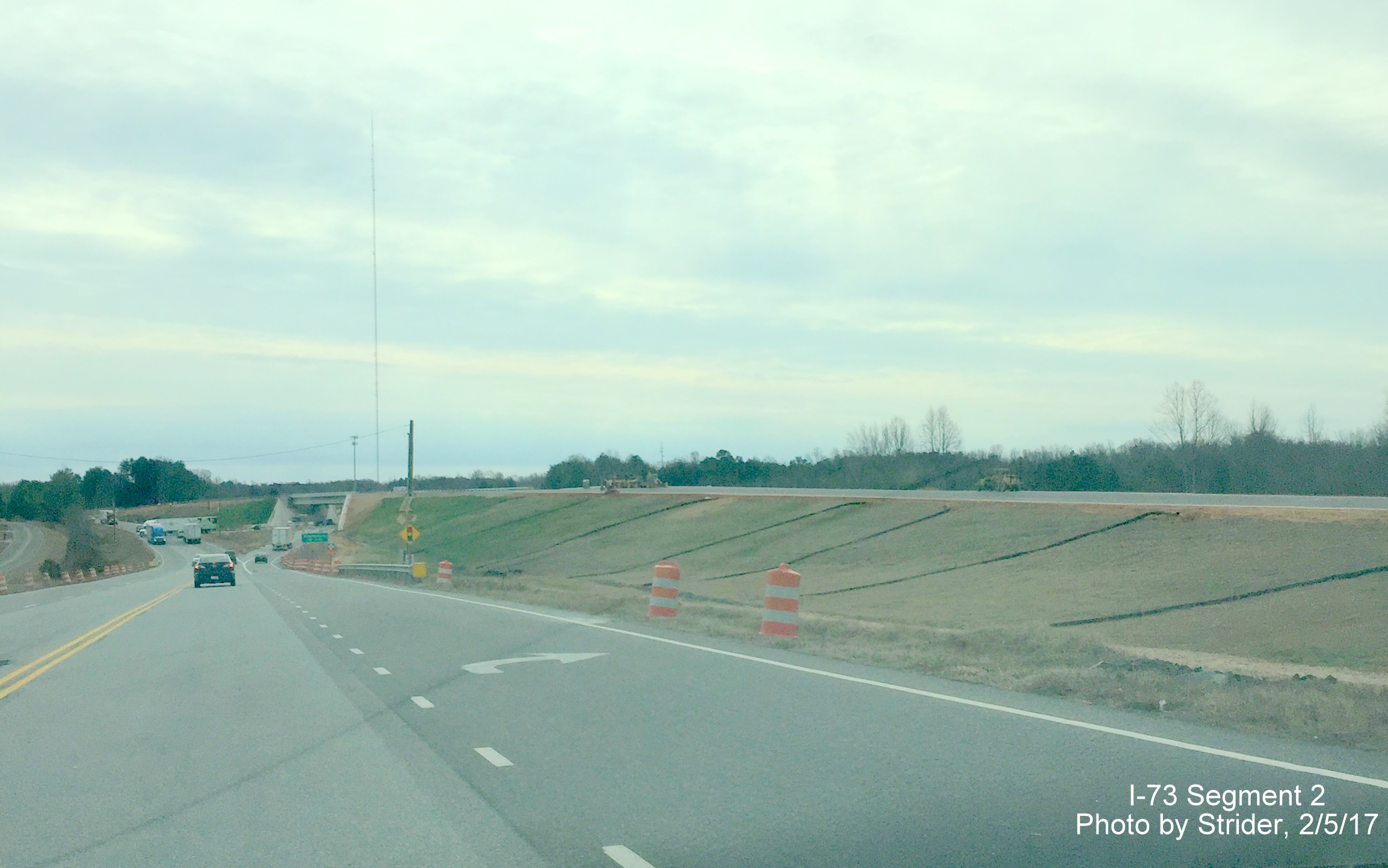 Image of view from US 220 North of progress building new flyover bridge for I-73 South at NC 68, from Strider