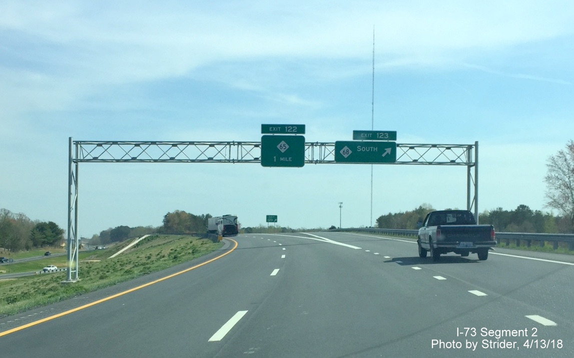 Image of existing exit signs at off-ramp to NC 68 on I-73/US 220 South in Rockingham County, now with exit number tabs, by Strider
