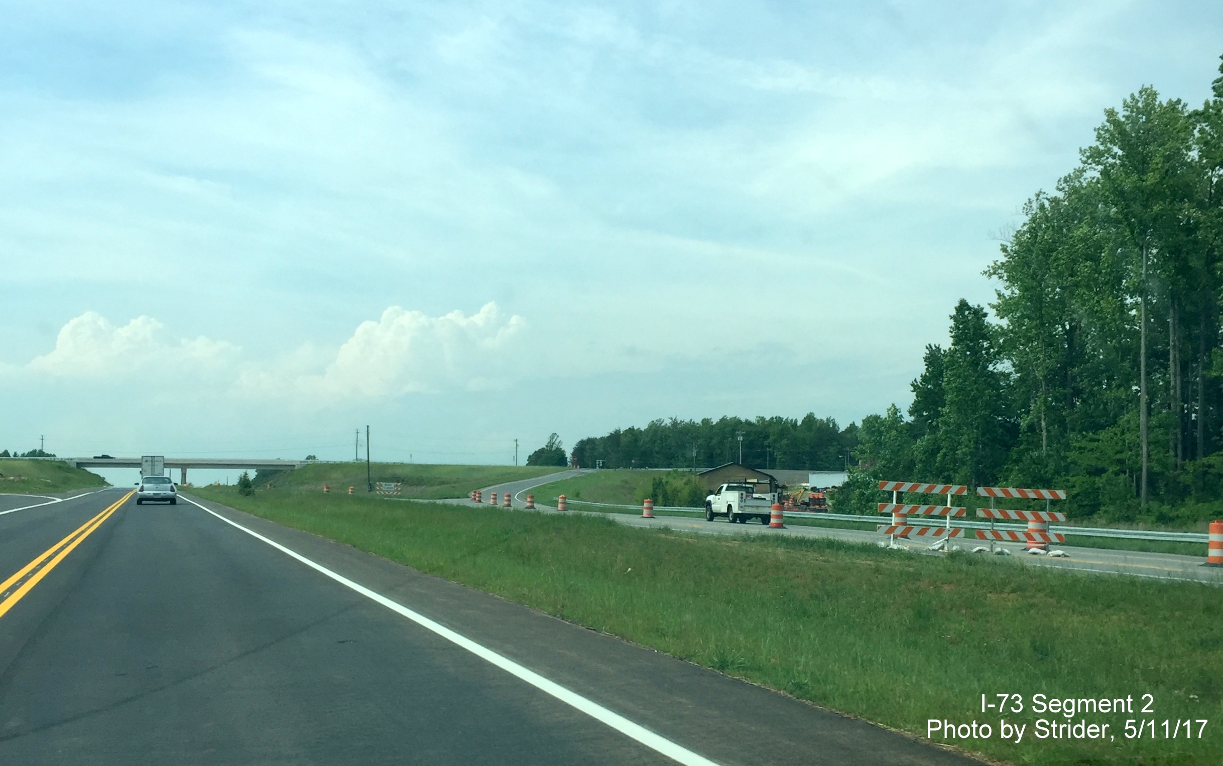 Image of recently opened off-ramp to NC 65 from US 220 North using Future I-73 South lanes, from Strider