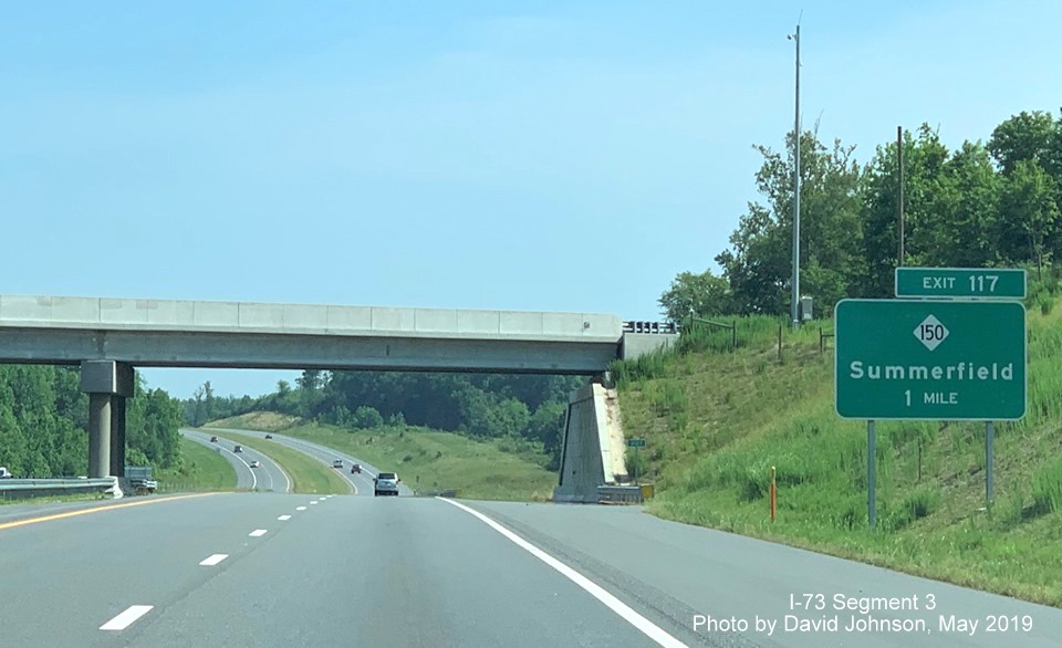 Image of ground mounted 1-mile advance sign for NC 150 exit on I-73 North in Summerfield, by David Johnson