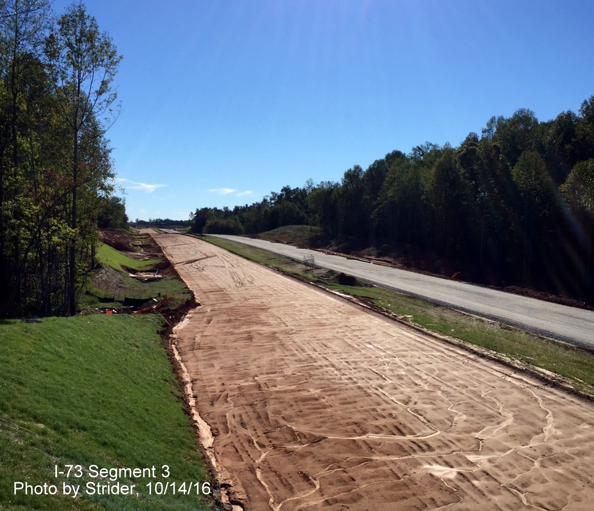Image looking south from Deboe Road showing construction progress on future I-73 highway, from Strider
