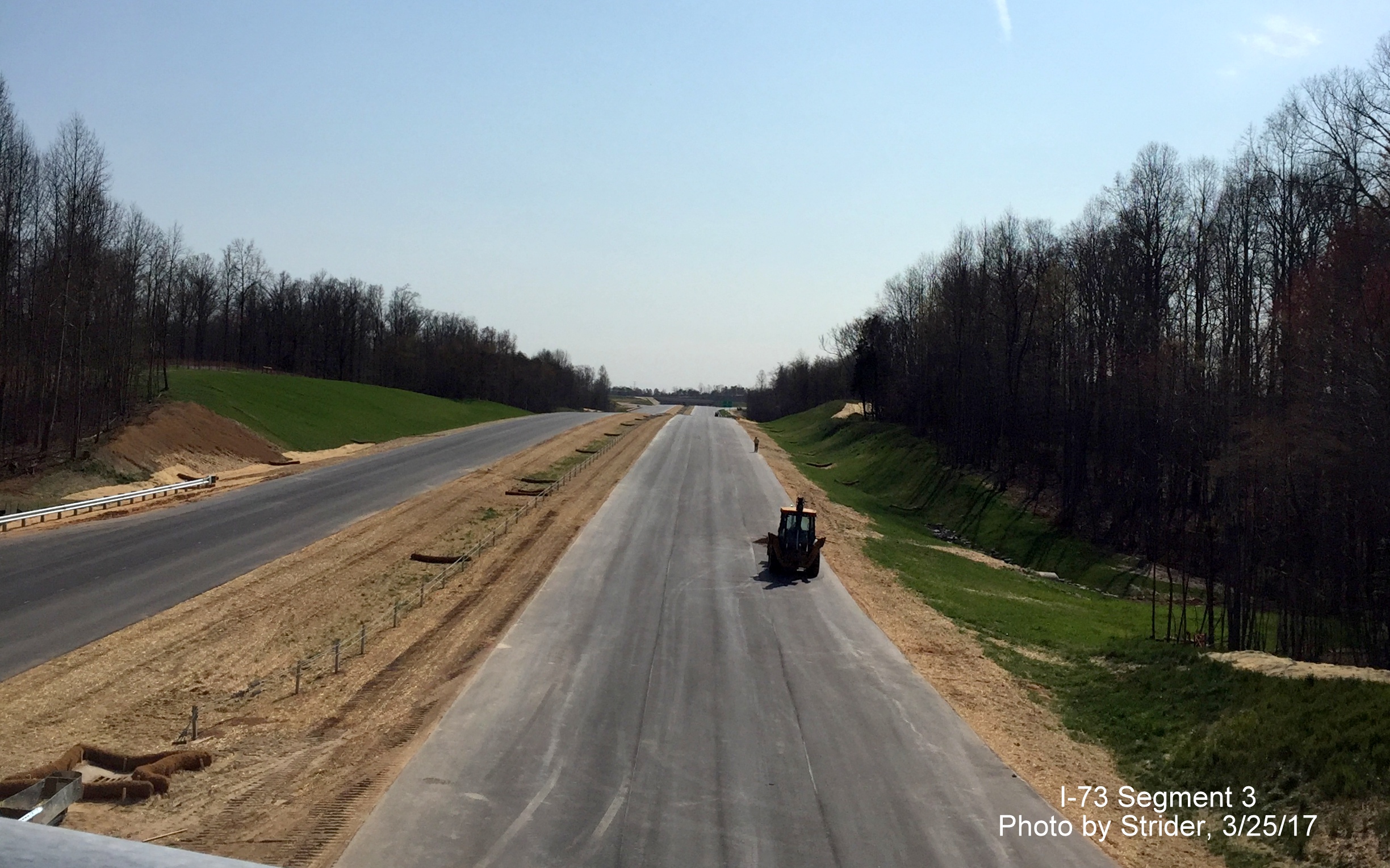 Image of view looking south from Deboe Road showing progress completing I-73 lanes, from Strider