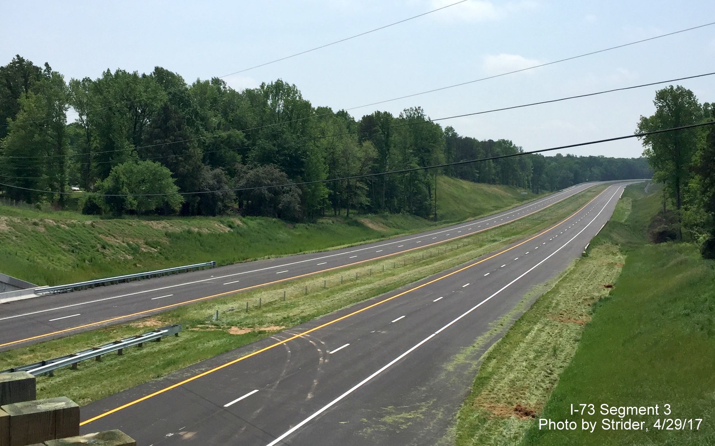 Image taken of view south of Alcorn Rd bridge of nearly completed Future I-73 roadway, by Strider