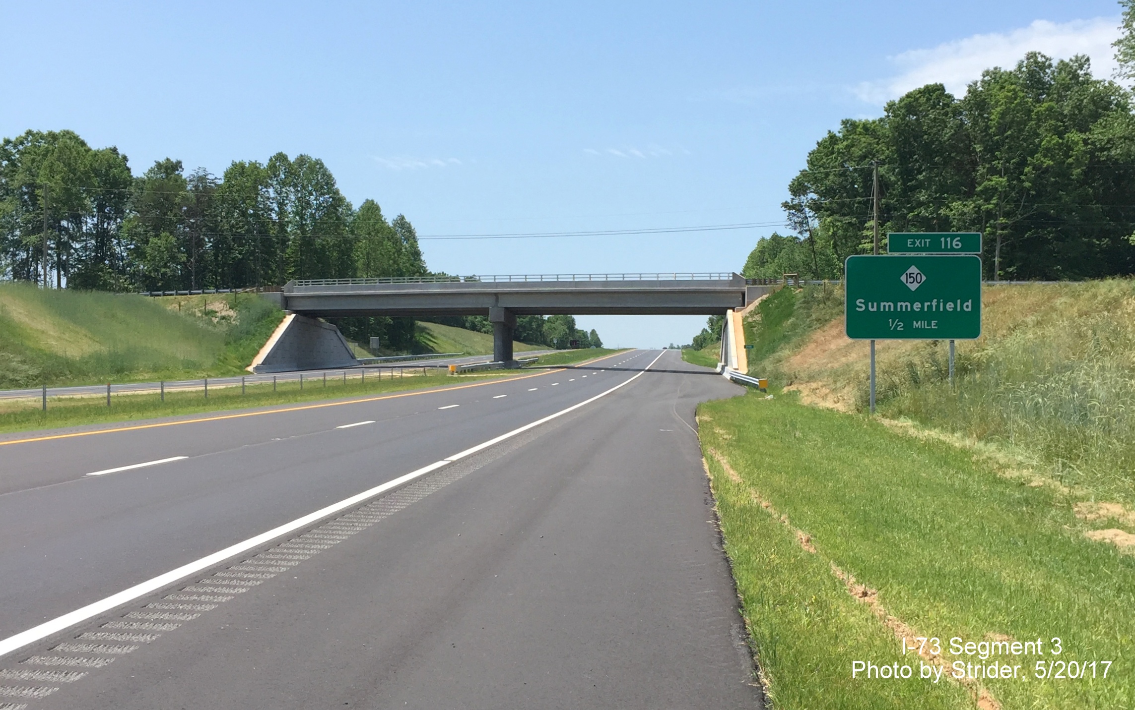 Image taken of new I-73 North highway about to cross Reedy Fork Creek bridge, by Strider