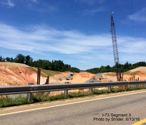 Image of construction around site of future I-73/NC 150 interchange, looking north, from Strider