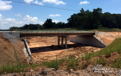 Image of new Bunch Road overpass being constructed over Future I-73 roadbed in Guilford County, photo from Strider