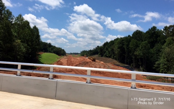 Image of I-73 construction looking south from completed Deboe Road bridge, photo by Strider