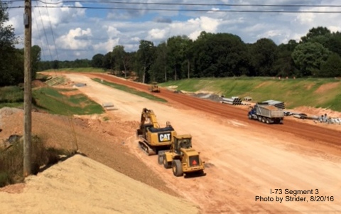 Image looking north from Deboe Road overpass showing grading for future I-73 roadway, from Strider