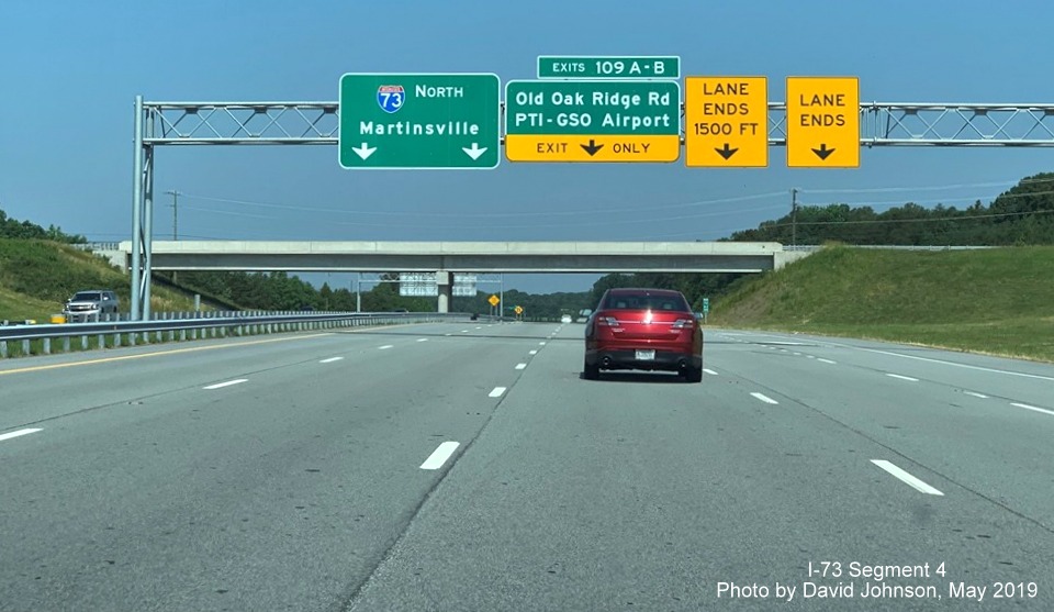 Image of overhead signage approaching Old Oak Ridge Road/PTI Airport exit on I-73 North in Greensboro, by David Johnson