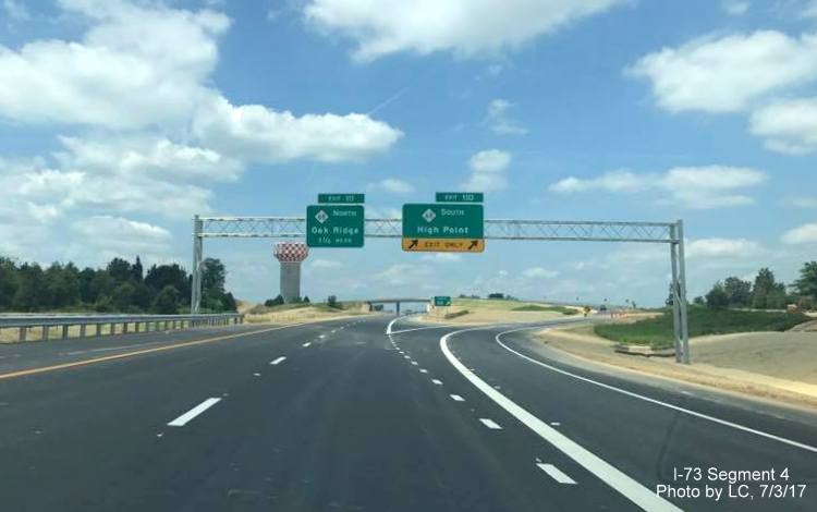 Image taken of overhead exit signs for NC 68 exits on newly opened segment of I-73 North in Greensboro, by LC
