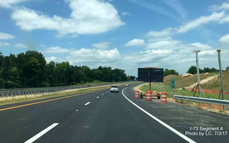Image taken of portable Variable Message Sign acting as NC 68 North exit sign on I-73 North in Greensboro, by LC