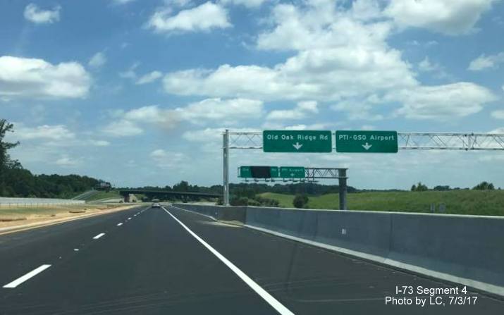 Image of new overhead signs to direct traffic on PTI Airport exit from I-73 South in Greensboro, by LC