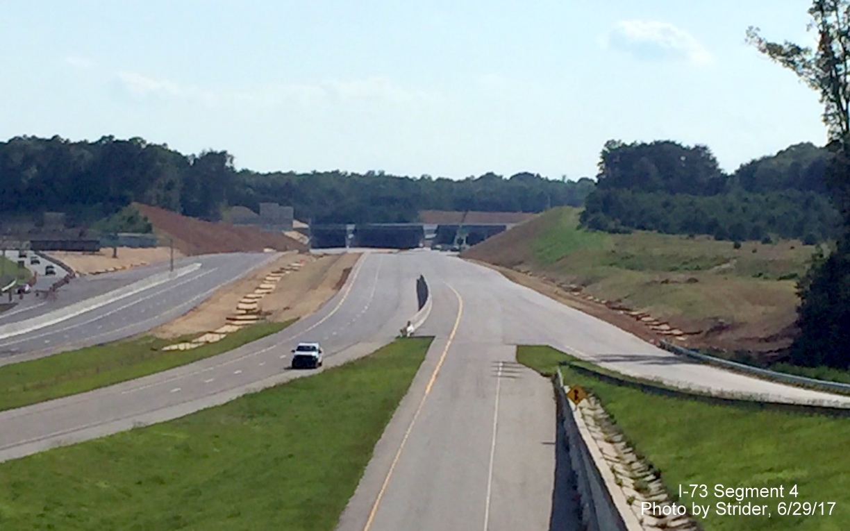 Image of nearly complete I-73 Connector roadway taken from Old Oak Ridge Rd bridge over Bryan Blvd, by Strider