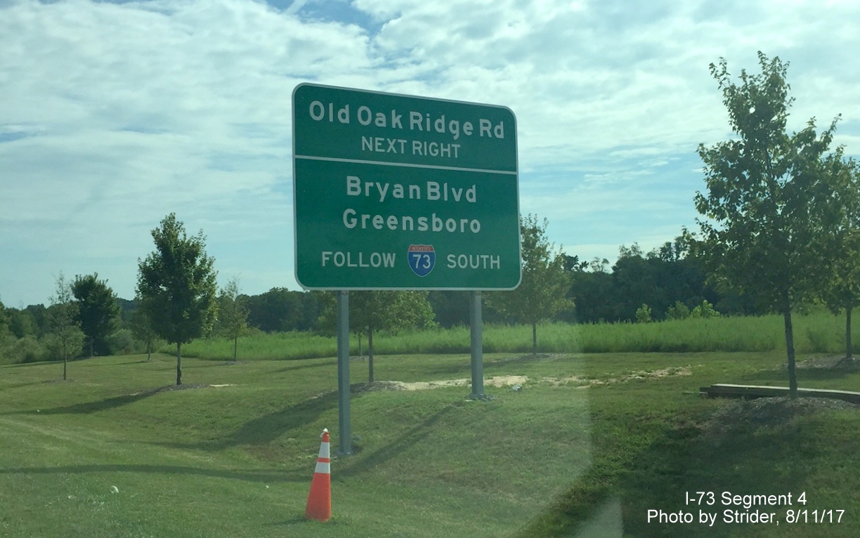 Image taken of signage along PTI Airport roadway directing traffic to Old Oak Ridge Rd and Bryan Blvd, by Strider
