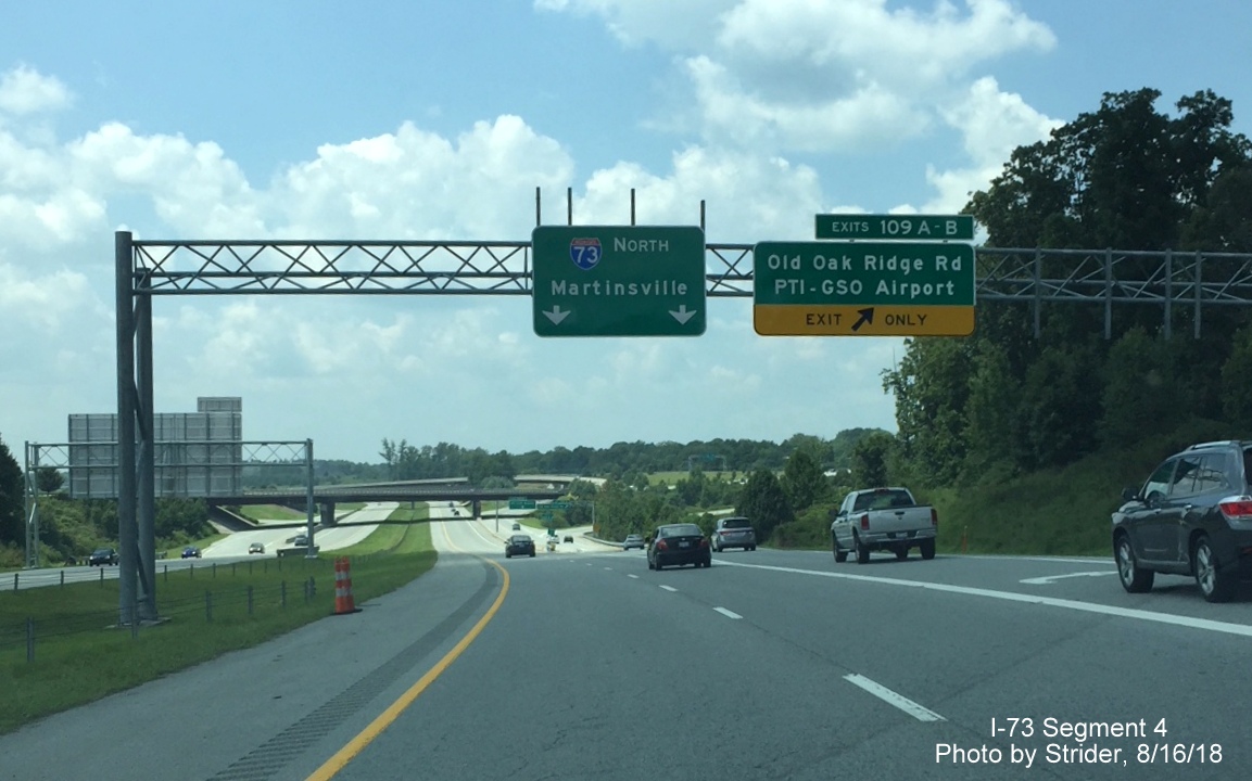 Image of recently placed I-73 North guide sign on overhead gantry at PTI Airport exit in Greensboro, by Strider