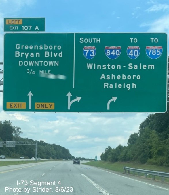 Image of 1/2 Mile advance sign for Greensboro Loop exit with new I-785 shield, replacing US 220 due to earlier 
        completion of Loop on I-73 South, photo by Strider, August 2023